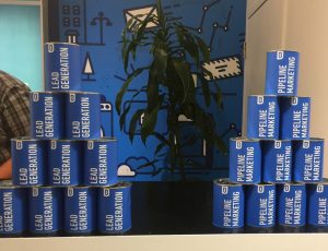 metal can wrapped in adhesive vinyl graphics